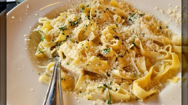 Fettuccine alfredo on a white plate