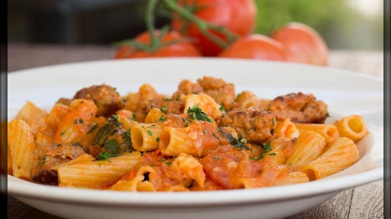 Pasta with shrimp sausage tomatoes