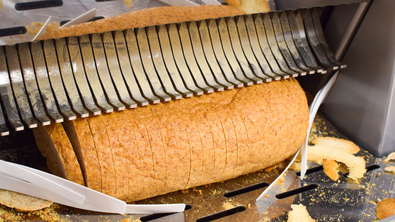 bread slicing machine in action