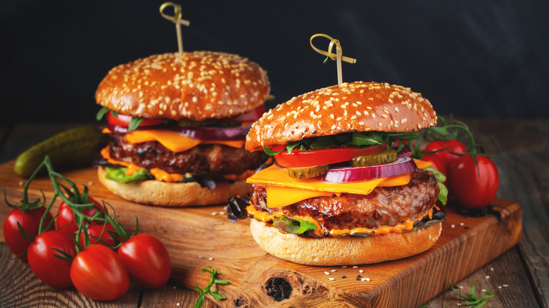 Burgers on wooden board