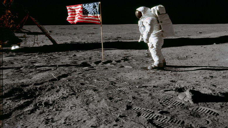 Astronaut on the moon's surface wearing a space suit