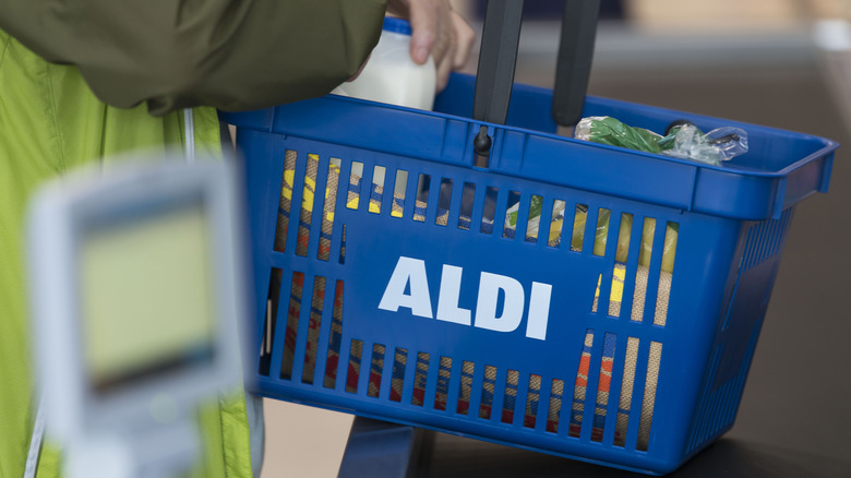 Groceries in Aldi basket at checkout