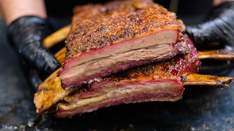 Ribs with smoke ring and charred rub