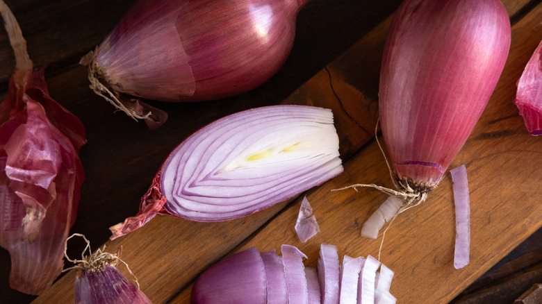 sliced shallots on cutting board