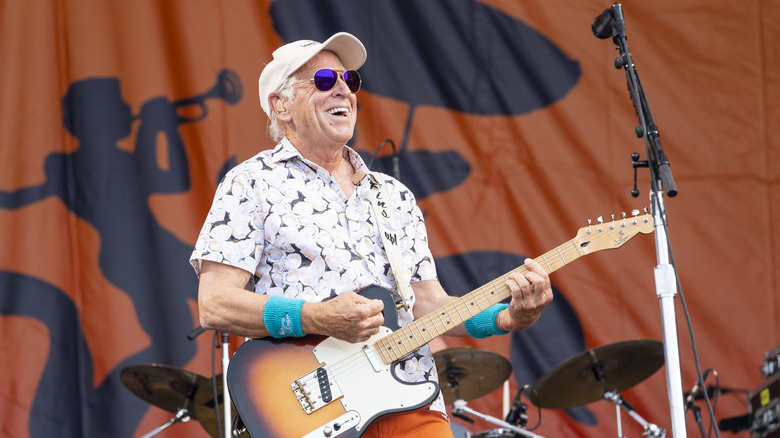 Jimmy Buffett performing at the 2022 Jazz Fest in New Orleans