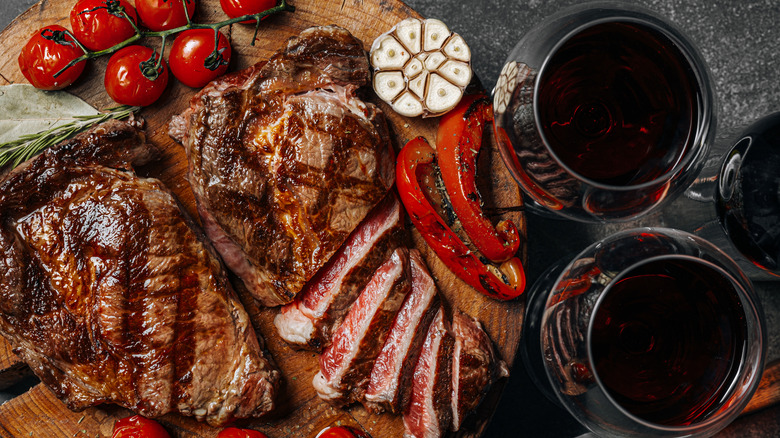 sliced steak and red wine 