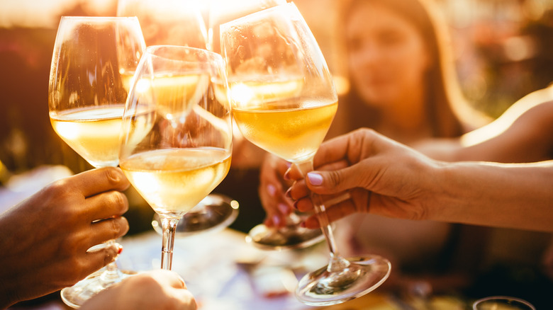 wine glasses clinking