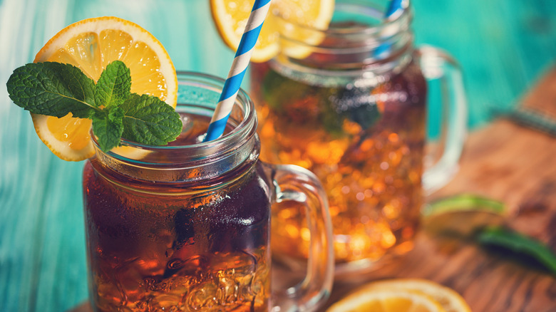Iced tea with lemon and mint in a jar