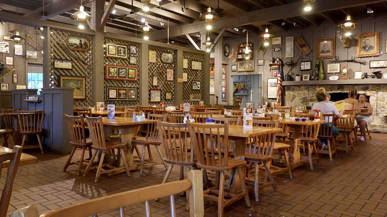 Customers enjoy food at a Cracker Barrel restaurant