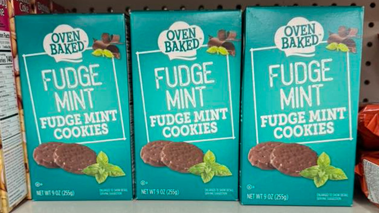 View of Oven Baked fudge mint cookie boxes lined up on a store shelf