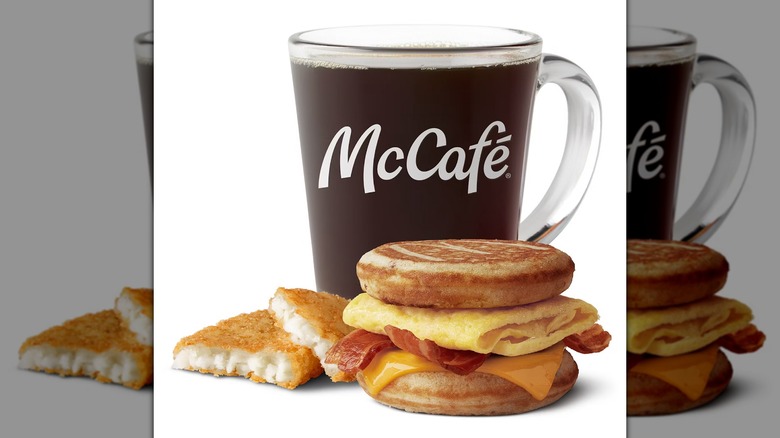 McDonald's McGriddle with hash browns and a McCafé coffee on a white background