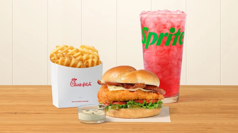 Chick-fil-A's jalapeño ranch club chicken sandwich with a strawberry hibiscus beverage and waffle fries