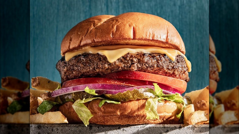 Close-up of the Dave & Buster's All-American burger with fries