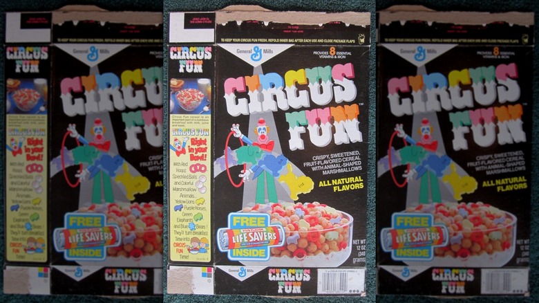 The front of a Circus Fun cereal box on a dark teal cloth