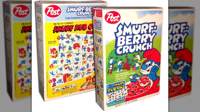 The front and back view of a Smurfberry Crunch cereal box on a white background