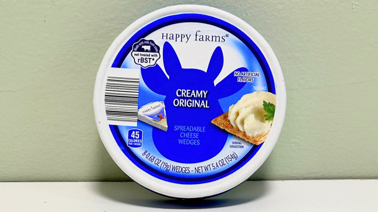 A container of Happy Farms Creamy Original Spreadable Cheese