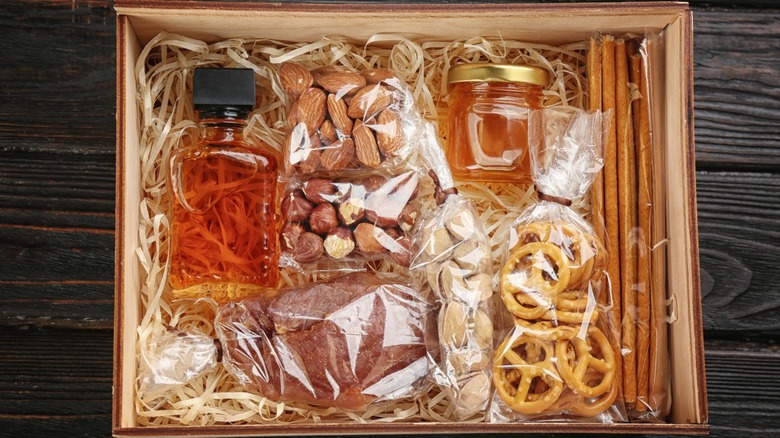 Gift box with pretzels, nuts, meat, and spreads