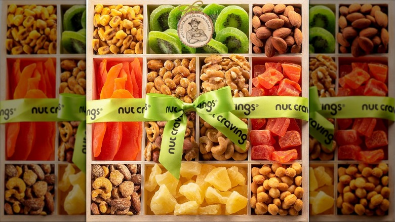Nut Cravings dried fruit and mixed nuts in a reusable wooden tray