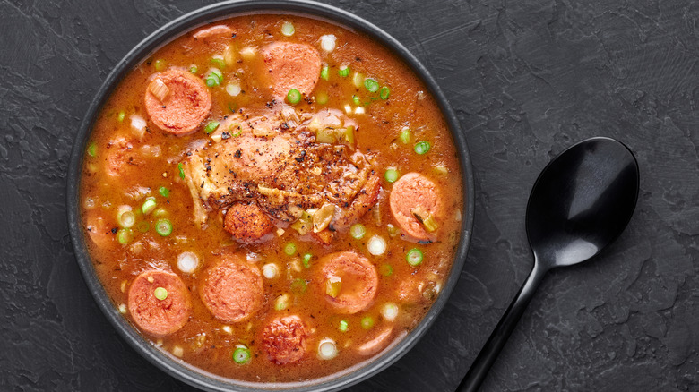 Sausage gumbo with a spoon 
