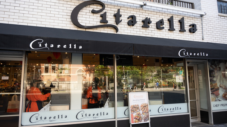 A glass window storefront of a Citarella store