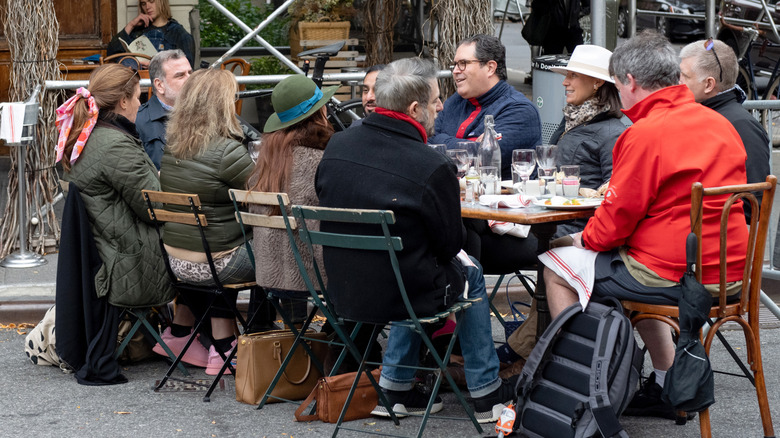 A table of customers eating outside at Morandi in NYC