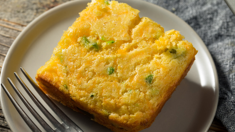 Cheddar jalapeno cornbread slice on plate