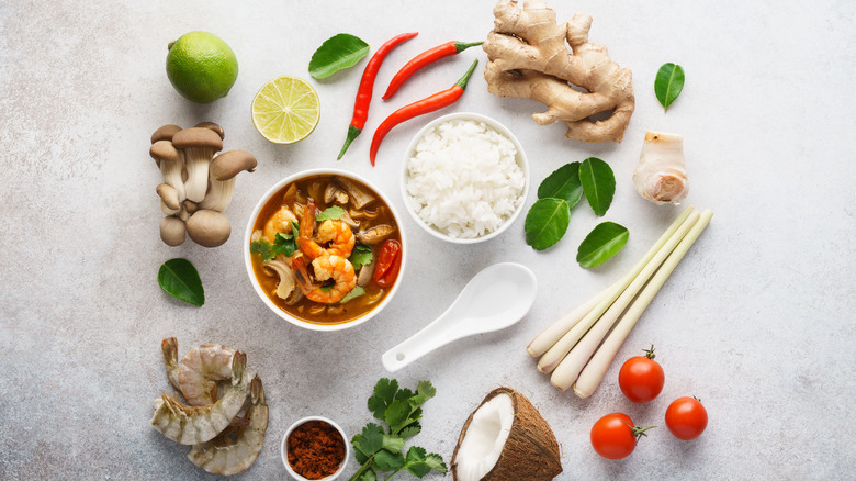 Set of ingredients for cooking Thai food arranged on a table