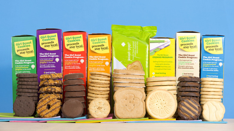 Girl Scout cookies and their boxes in a row