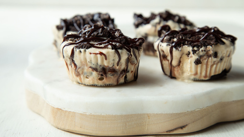 ice cream cupcakes with a chocolate topping