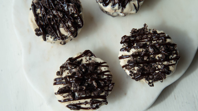 ice cream cupcakes with a chocolate topping