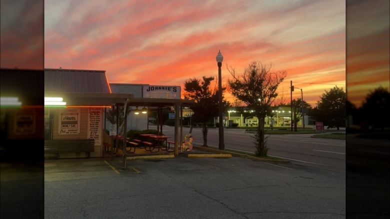 Exterior of Johnnie's Drive-In at sunset