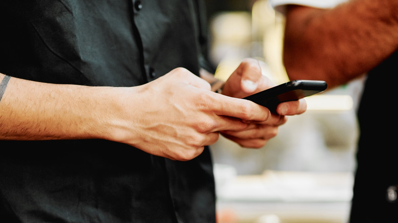 A person using their phone