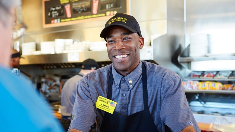 employee smiling at customer