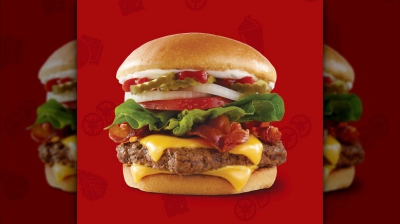 Wendy's Bacon Burger on red background