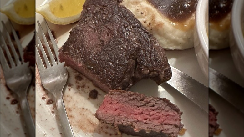 A close-up of a sliced steak from Hoss's Steak and Sea House