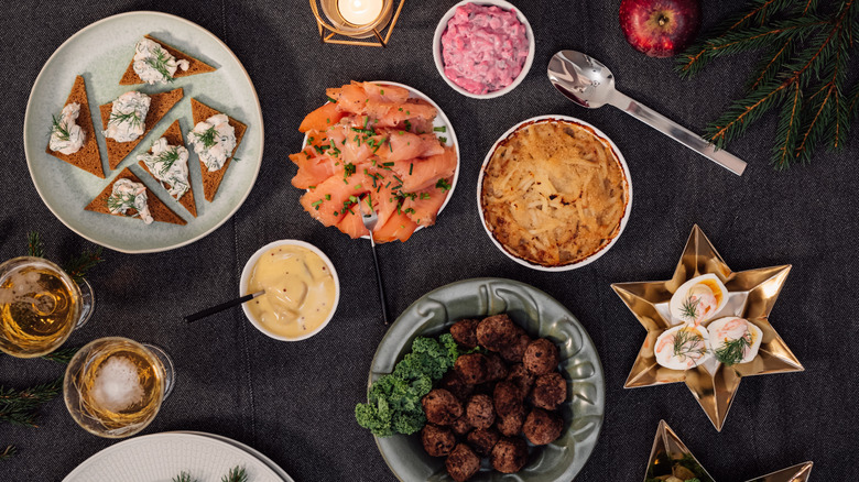 A spread of old-fashioned dinner party foods, including Swedish meatballs