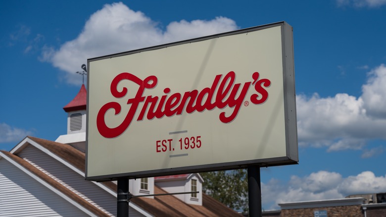 A large white sign with Friendly's written in red cursive