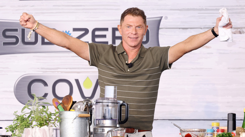 Bobby Flay putting on a demonstration at the 2024 South Beach Wine and Food Festival