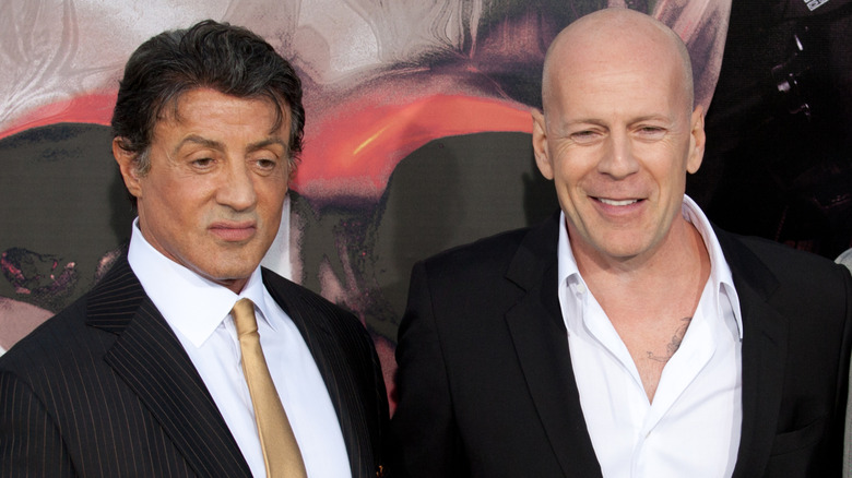 Bruce Willis and Sylvester Stallone at a premiere