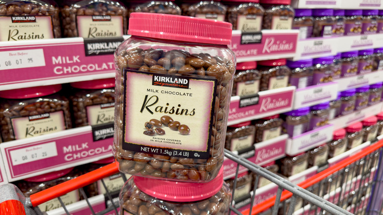 Costco Kirkland Chocolate Covered Raisins in a cart