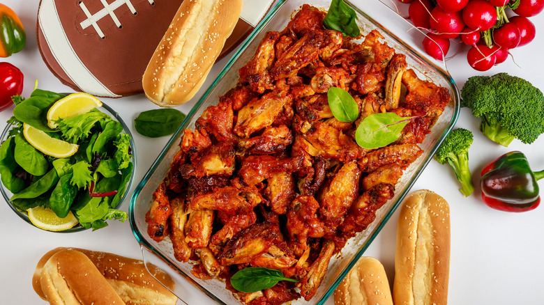 Football appetizers, chicken, vegetables, bread