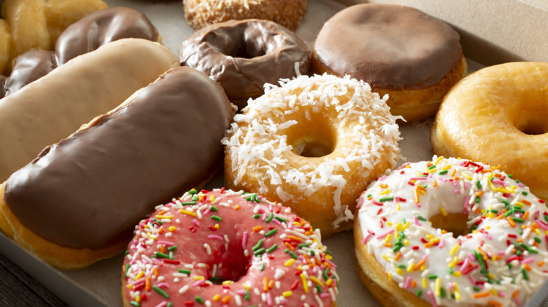 An assortment of a dozen donuts
