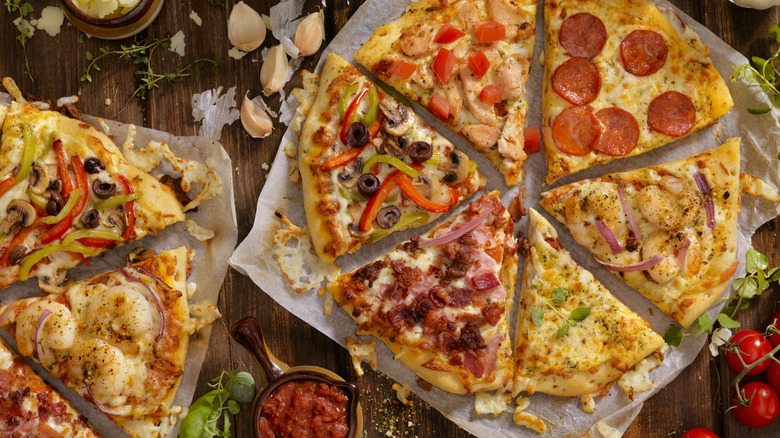 Overview of various flavors of pizza slices