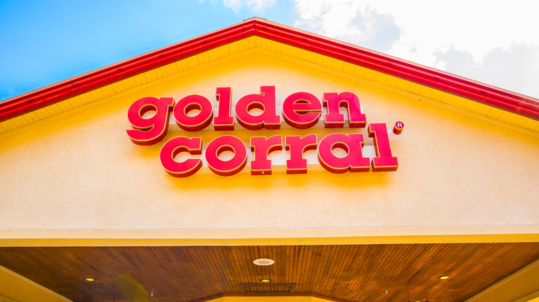 Bright yellow and red awning over the entrance of a Golden Corral buffet
