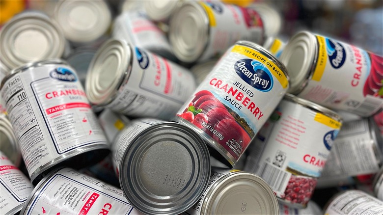 Cans of cranberry sauce piled together