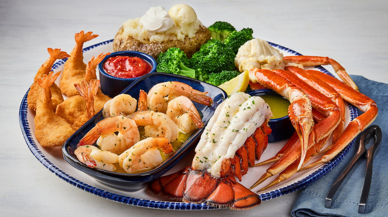 A Red Lobster Ultimate Feast platter with shrimp, lobster, crab and sides