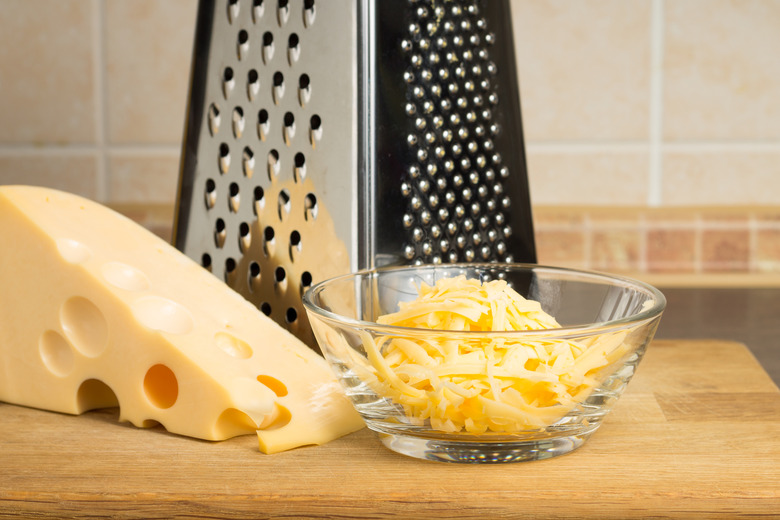 https://www.thedailymeal.com/img/gallery/this-is-how-youre-actually-supposed-to-use-your-cheese-grater/dreamstime_m_35954093.jpg