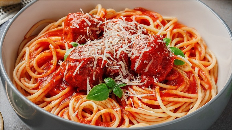 spaghetti and meatballs in a pot
