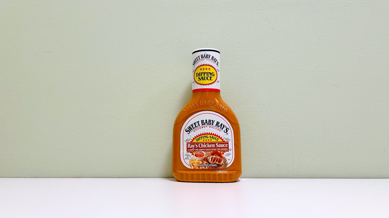 Sweet Baby Ray's chicken sauce on white counter