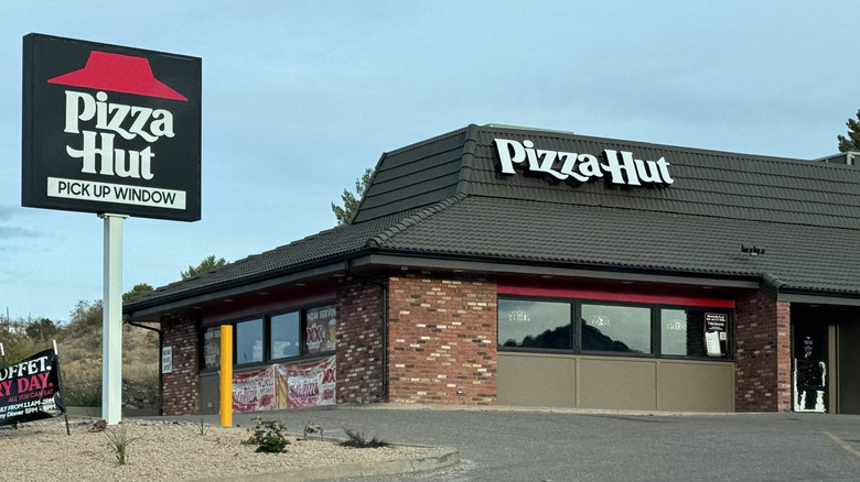An '80s-style Pizza Hut exterior with old logo
